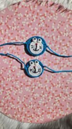 Doraemon Kids Crochet Rakhi (Sold Individually)