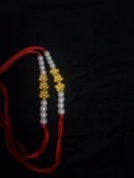 Golden Floral & Pearl Beaded Rakhi - Image 2