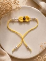 Om Crochet Bow & Pearl Rakhi - Image 3